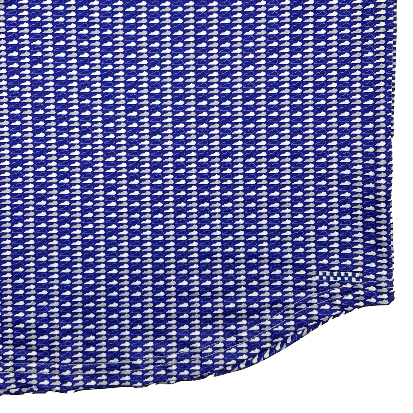 Close-up of a blue and white woven fabric with a visible brand label.